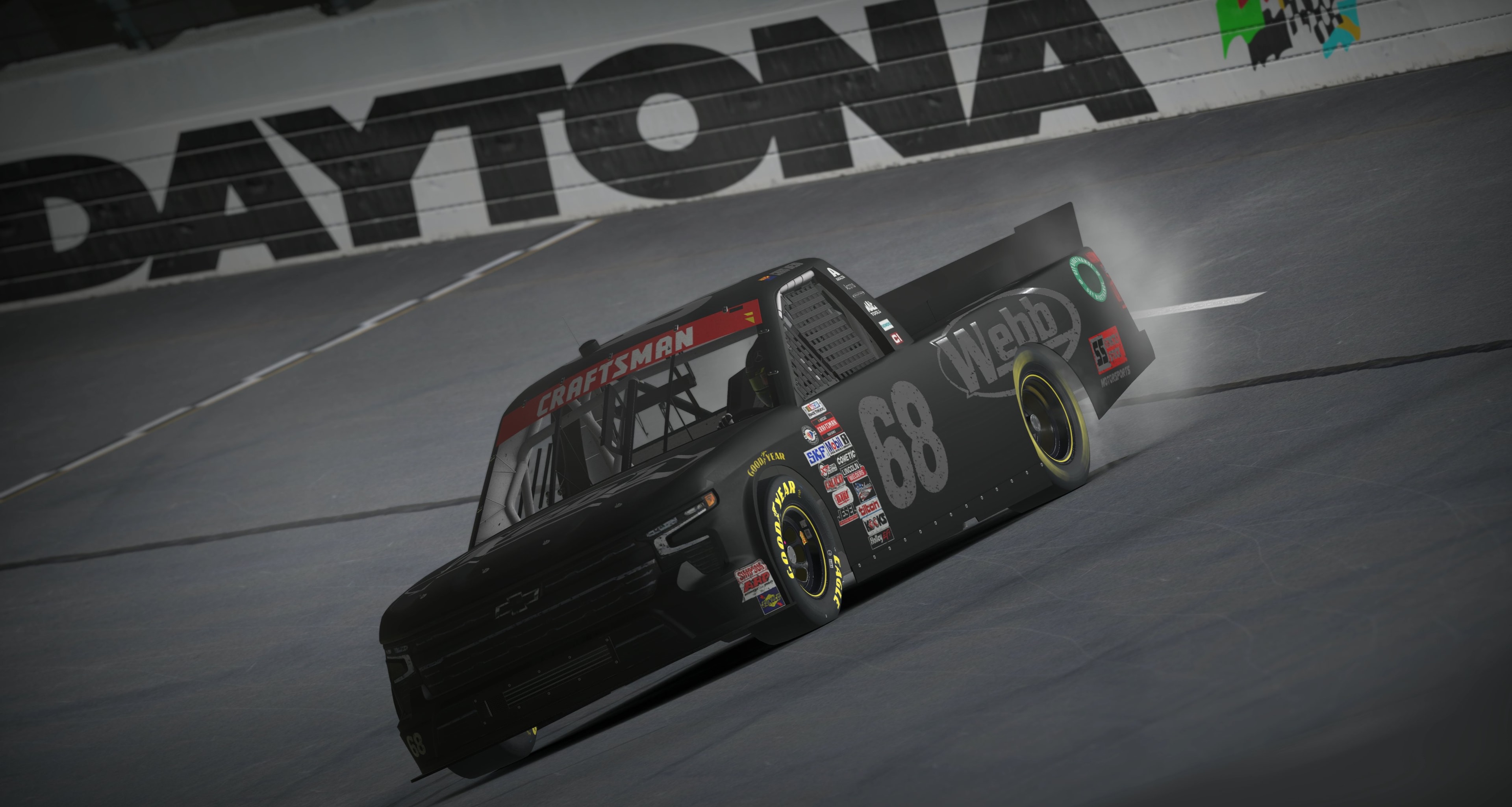 Chris Webb #68 black truck at Daytona in the rain