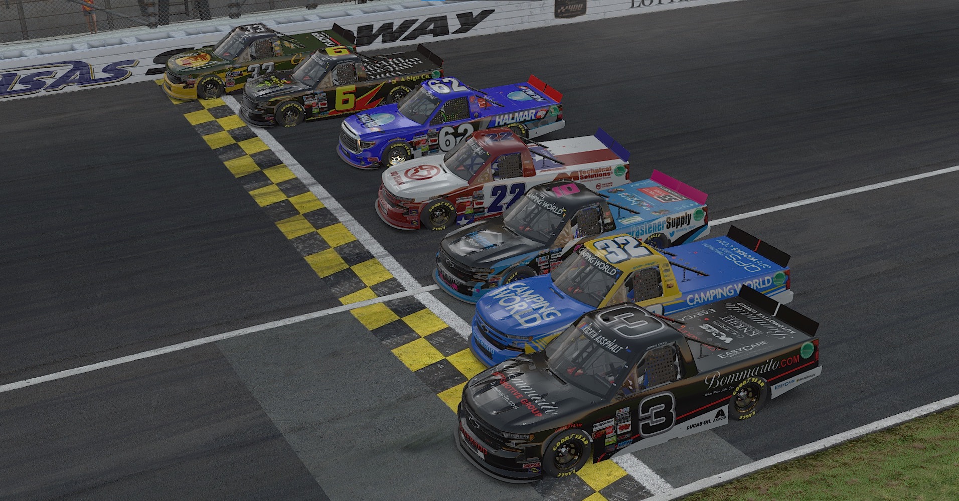 Trucks lined up at the start